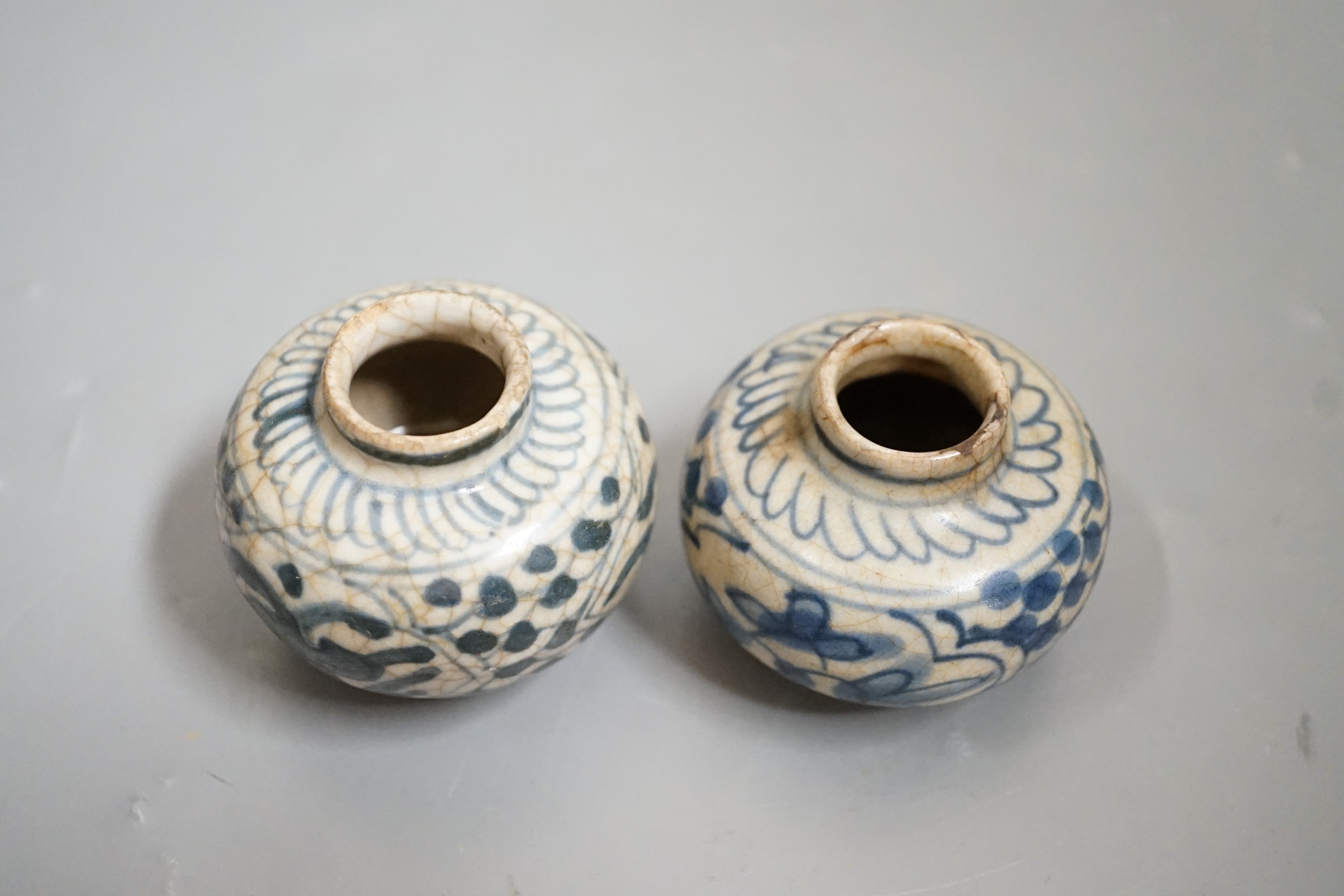 Two Chinese Swatow blue and white jarlets, early 17th century, 5cm tall